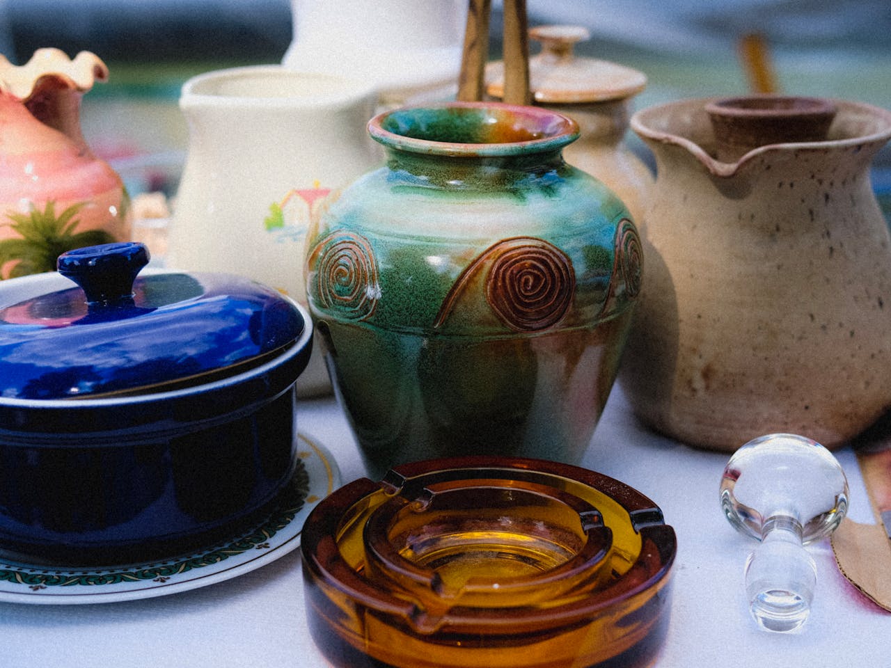 A vibrant collection of ceramic and glass vases showcasing artistic designs.